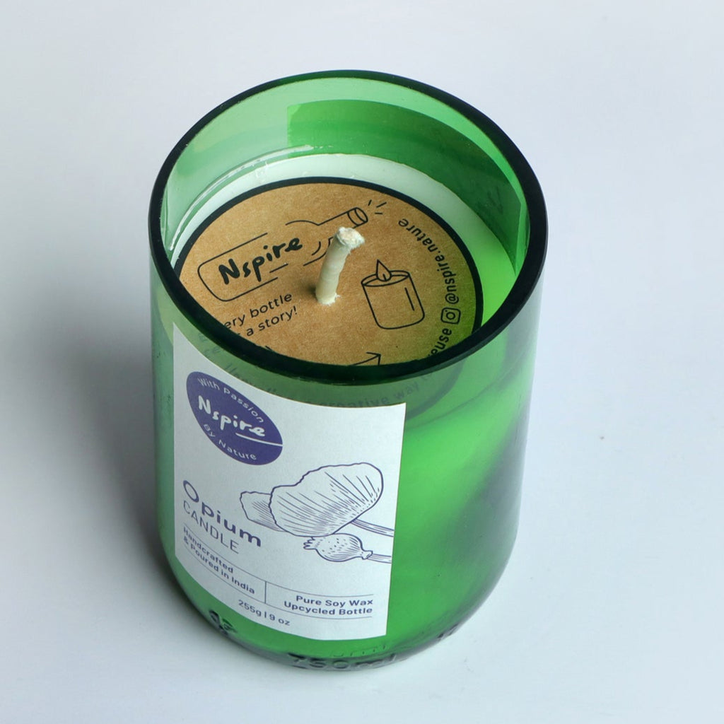 Luxurious opium-scented candle with a rich, exotic fragrance, designed to create a warm and indulgent atmosphere in any room